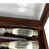 Carving set with deer handle and double nickel silver and steel ferrule in a wooden box with a glass lid